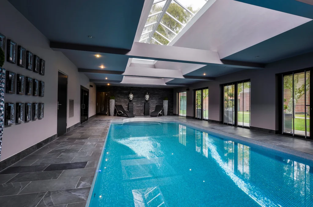 Modern indoor swimming pool with skylight and contemporary design