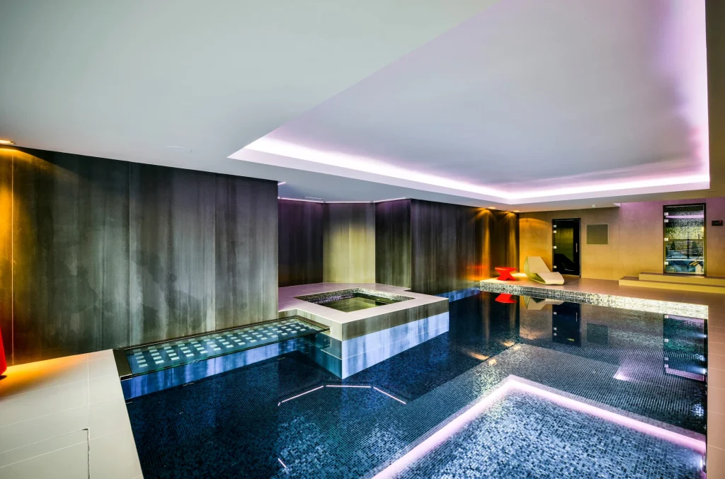 Modern luxury spa with indoor pools and ambient lighting