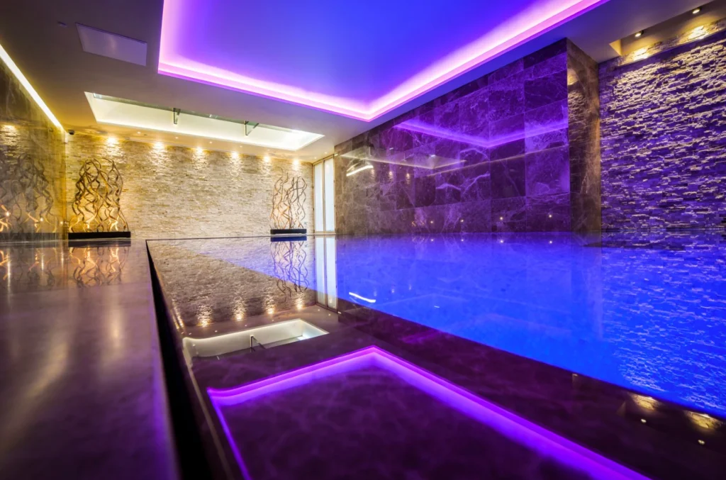 Modern spa pool with purple and blue LED lighting